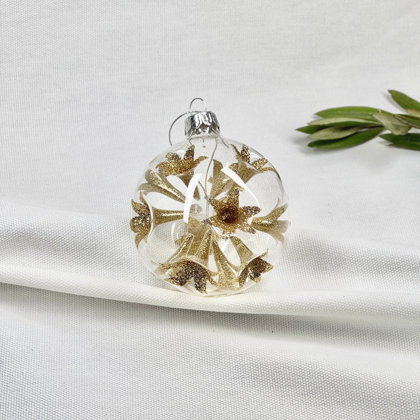 Round Glass Ornament With Gold Stars