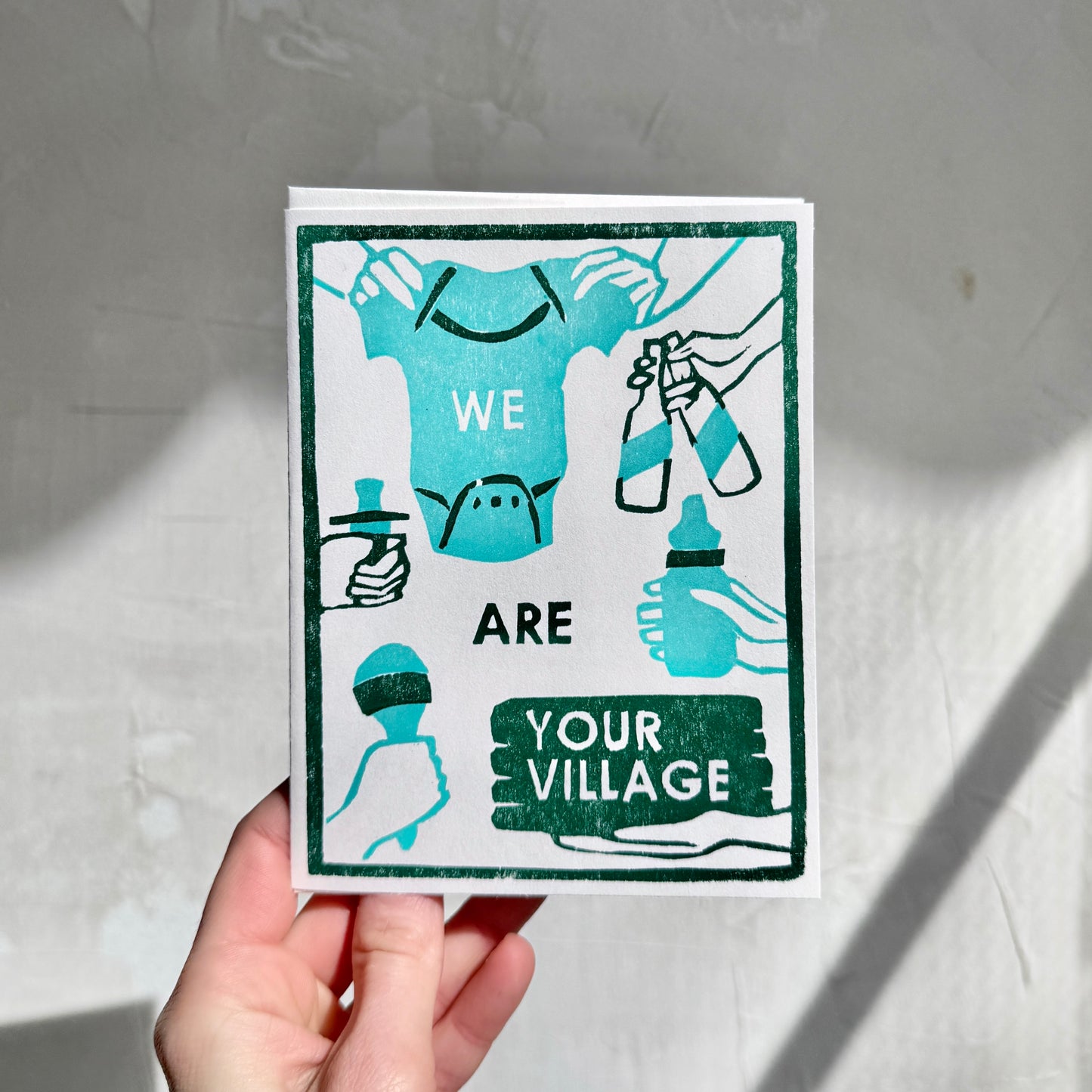 'We Are Your Village' Card