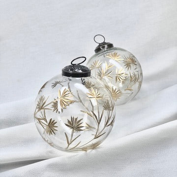 Glass Ball Ornament With Golden Floral Motif