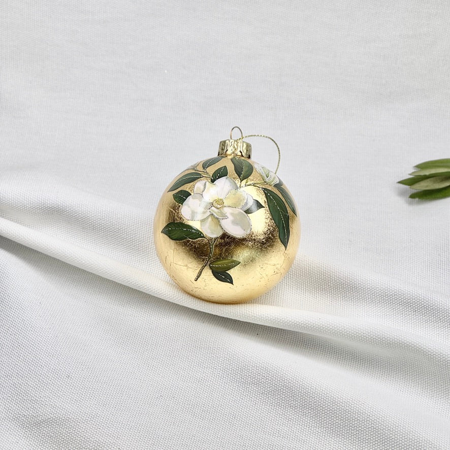 Golden Glass Ball Ornament With White Flowers