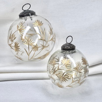 Glass Ball Ornament With Golden Floral Motif