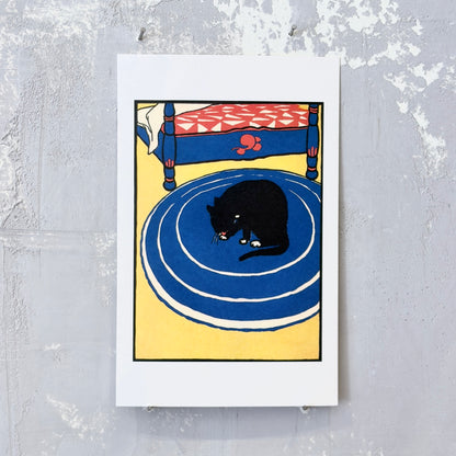 Black Cat on Round Rug Postcard