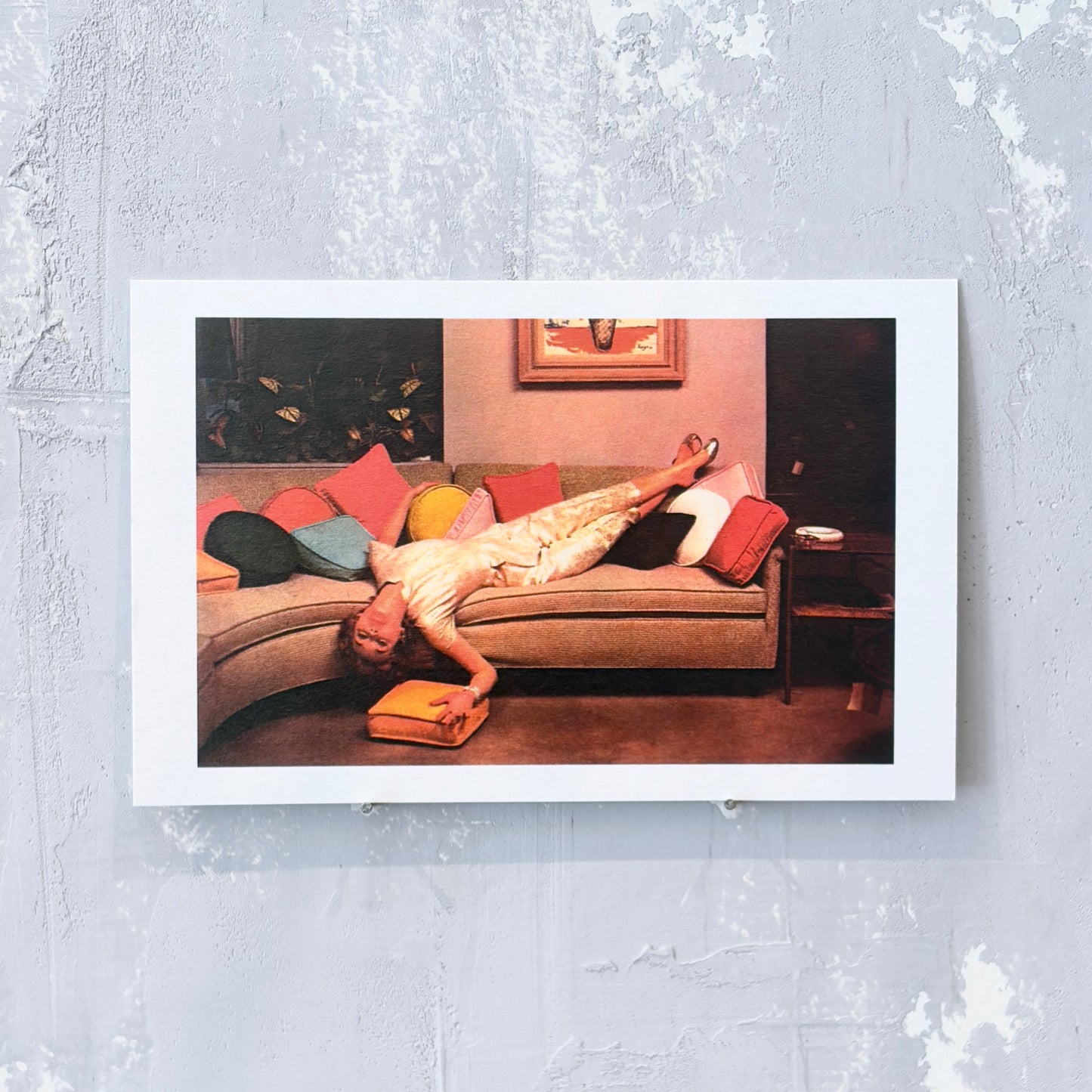 Woman Lounging on Couch Retro Postcard