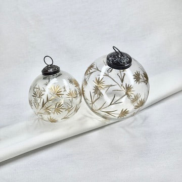 Glass Ball Ornament With Golden Floral Motif